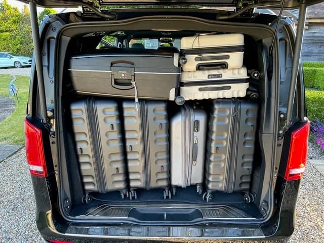 Boot of the StrasVan Mercedes V-Class van loaded with large suitcases and cabin bags for a Strasbourg to Europa-Park trip